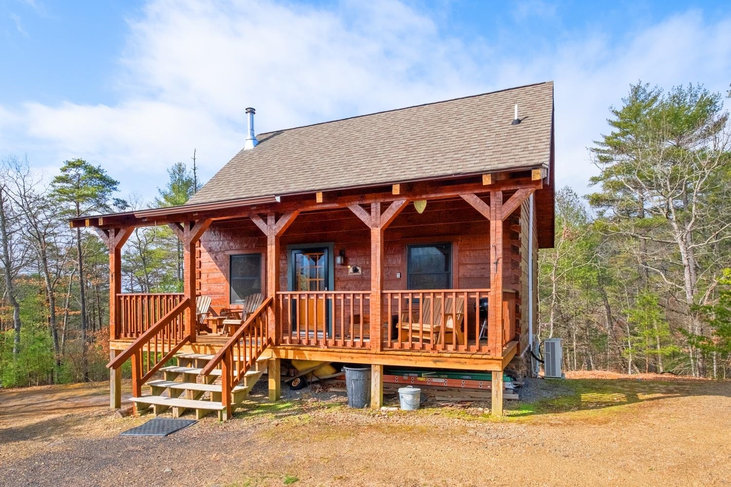 front view of a house with a wooden fence