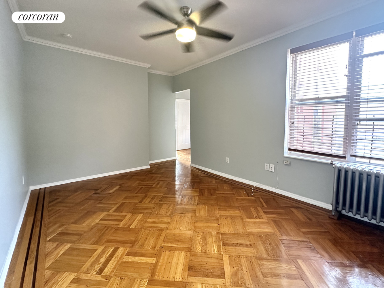 a view of an empty room and window