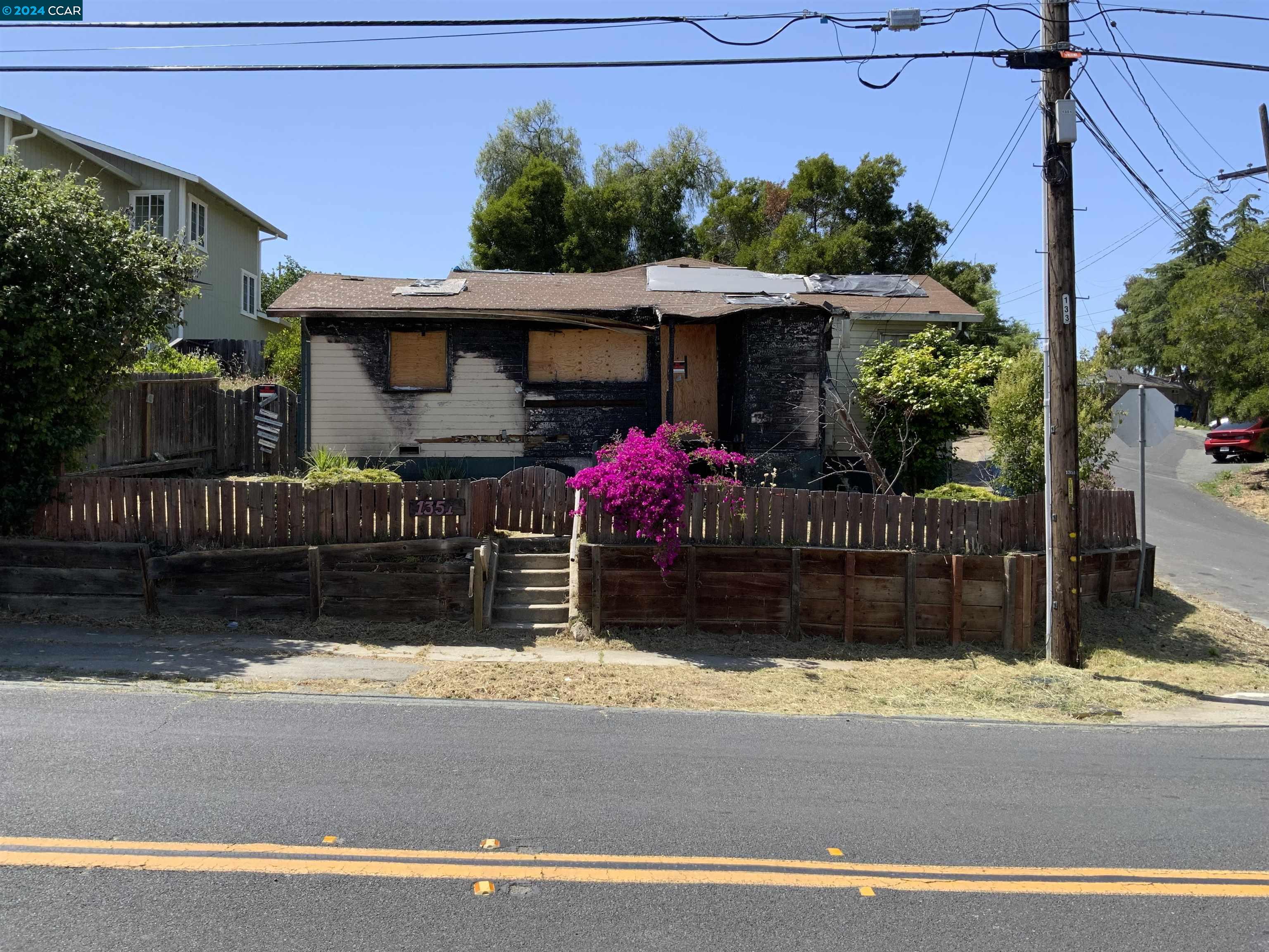 a front view of a house with a garage