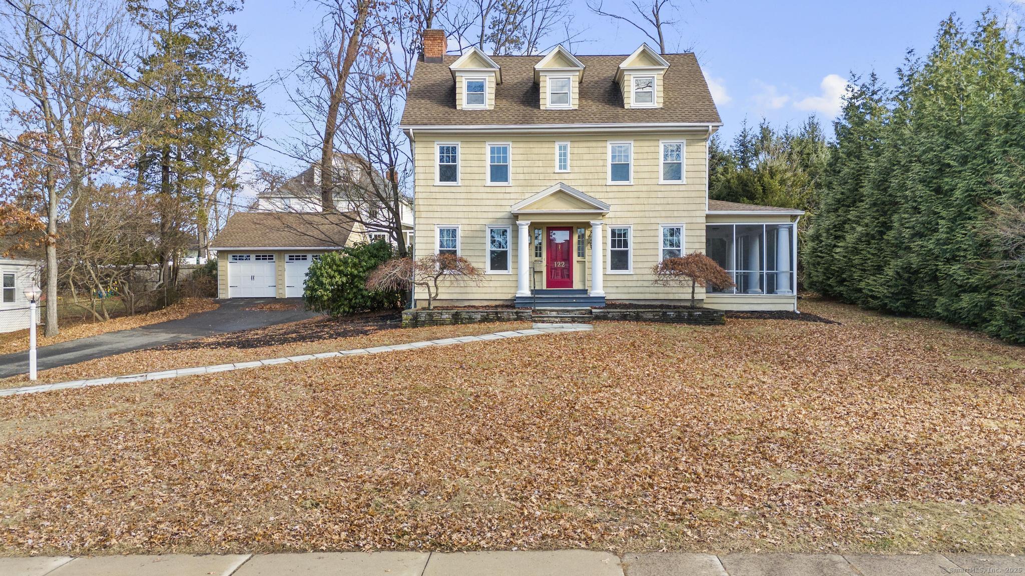 front view of house with a yard