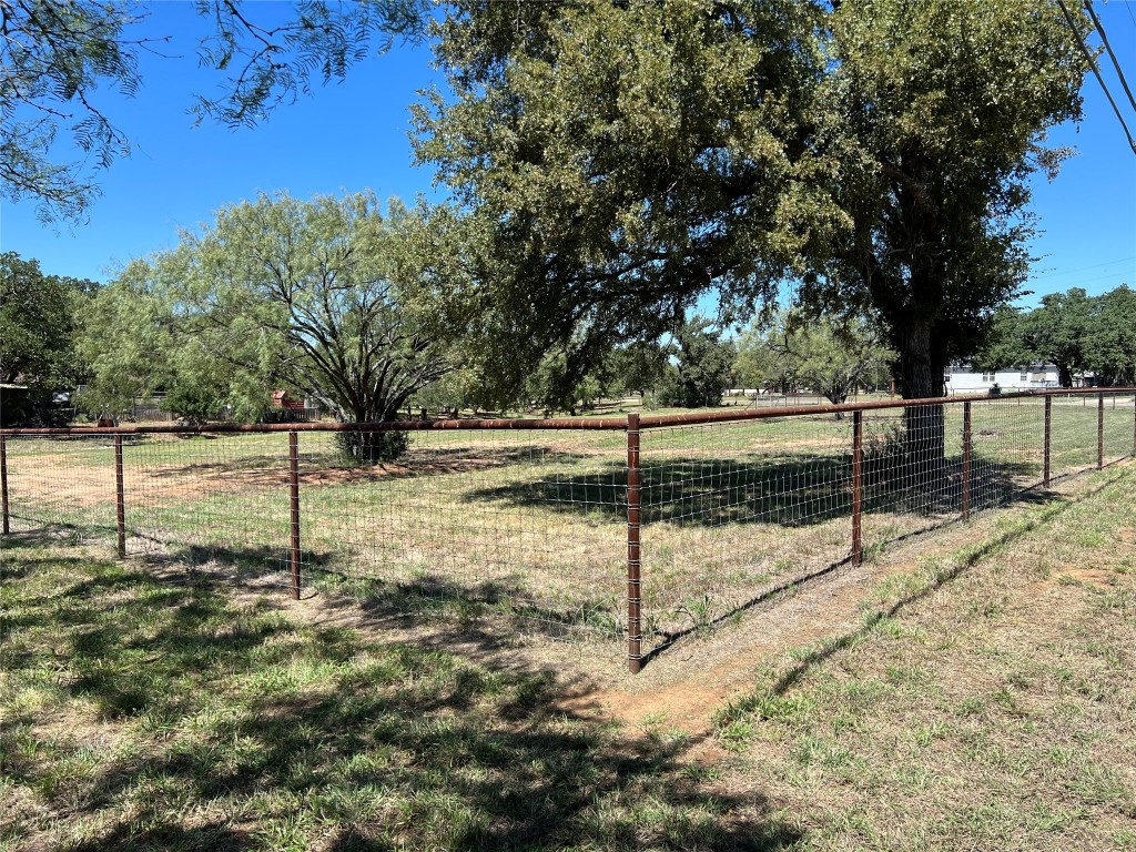 a view of yard and trees