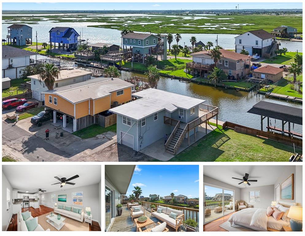 an aerial view of residential houses with outdoor space and ocean view