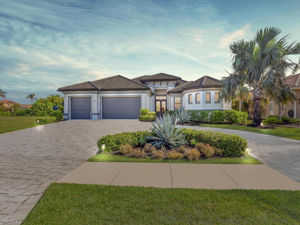 View of front of home featuring a garage