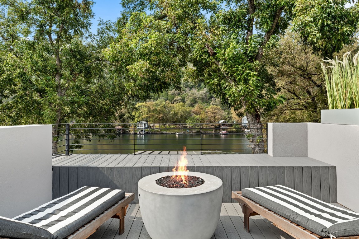 a view of a chair and tables in the patio