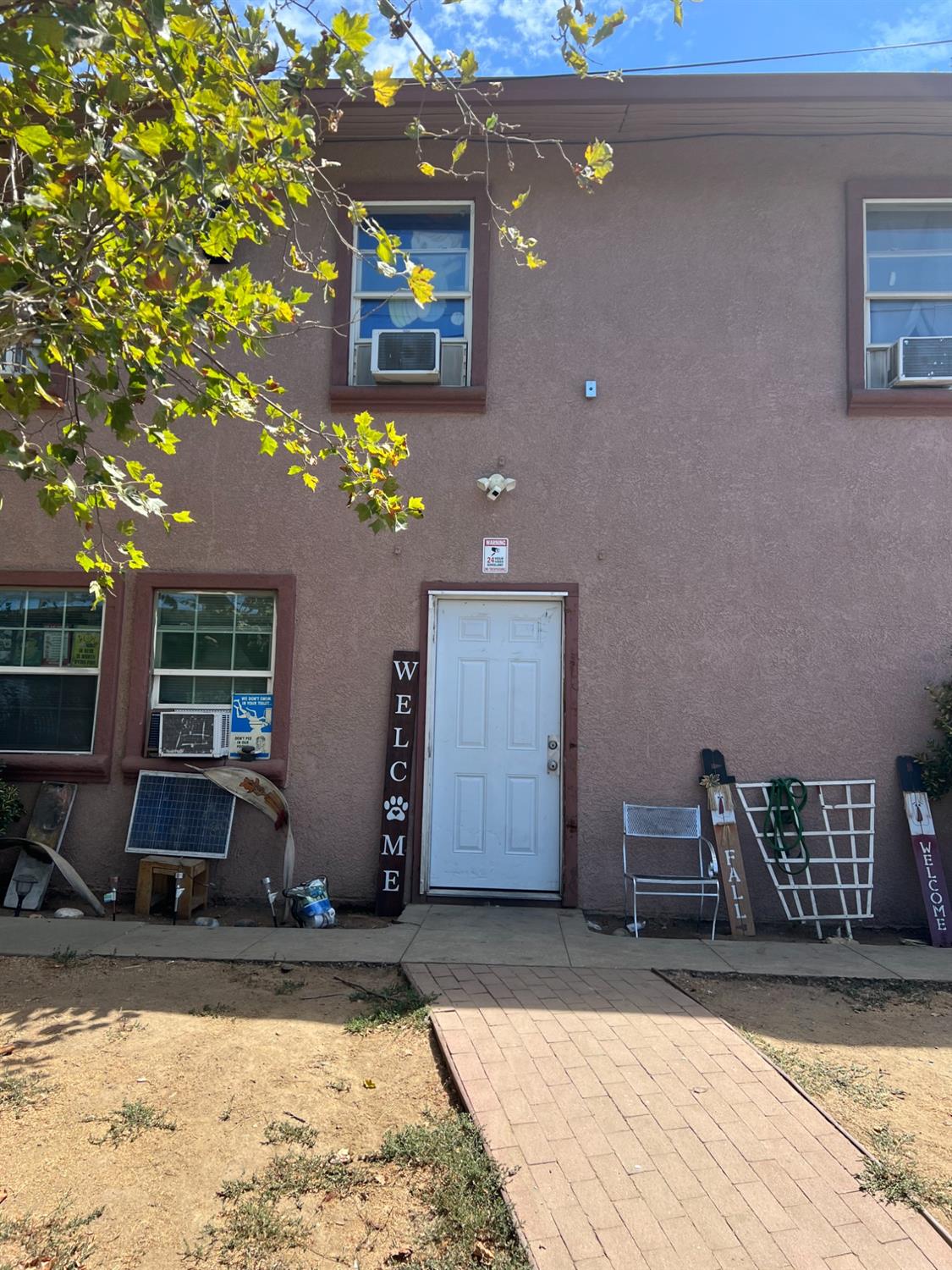 a front view of a house with parking