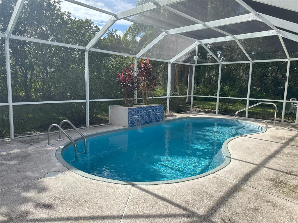 a view of a swimming pool with a sink