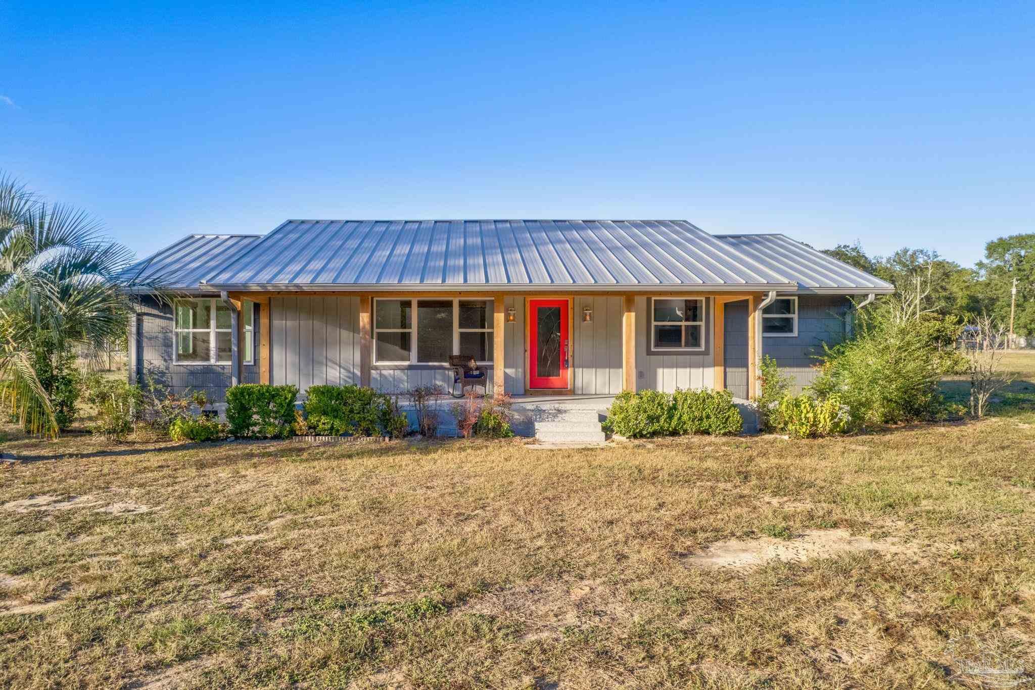 front view of a house with a patio