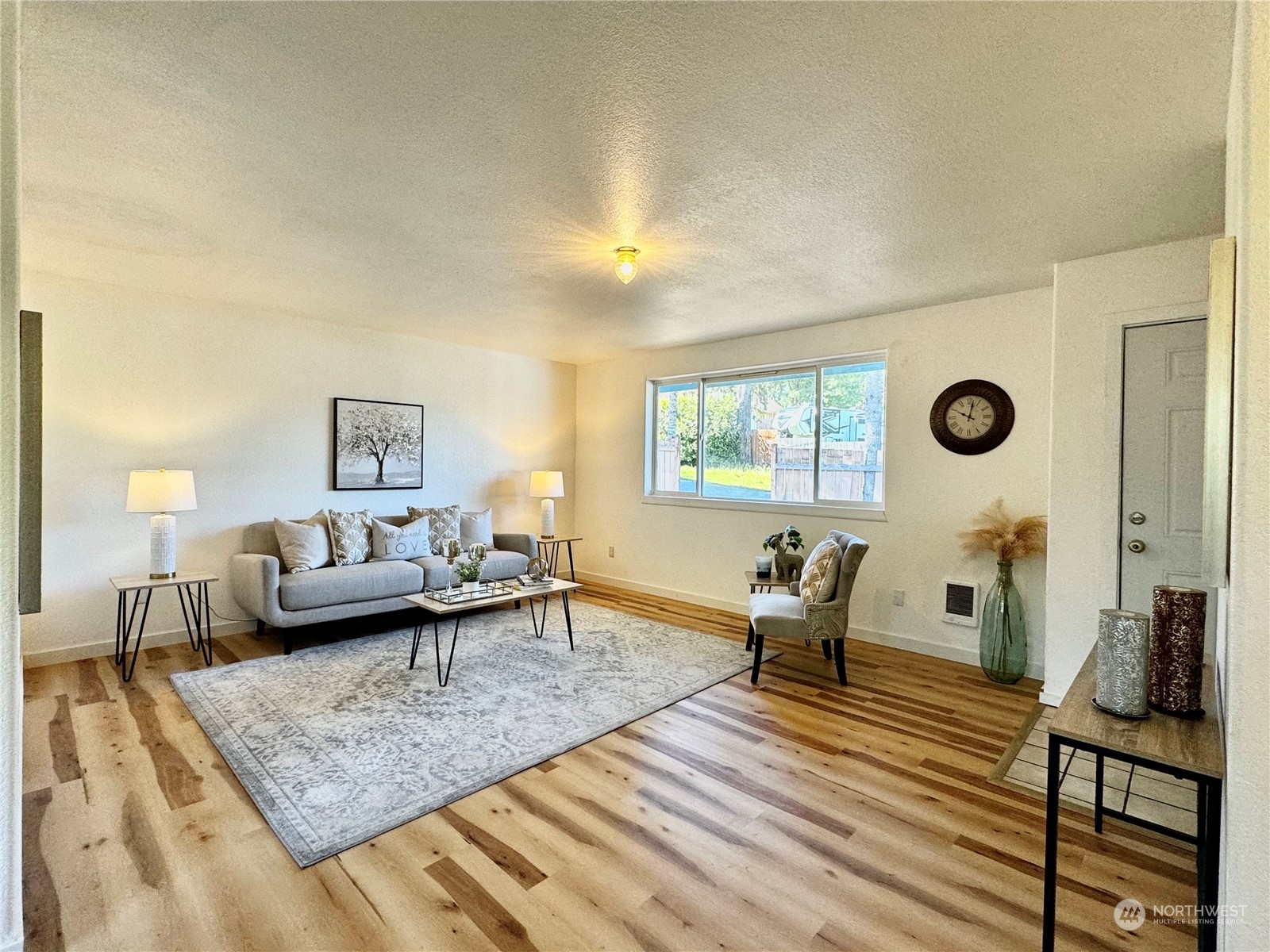 a living room with furniture and a table