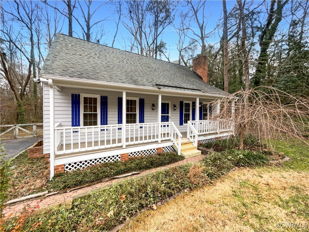 front view of a house with a small yard