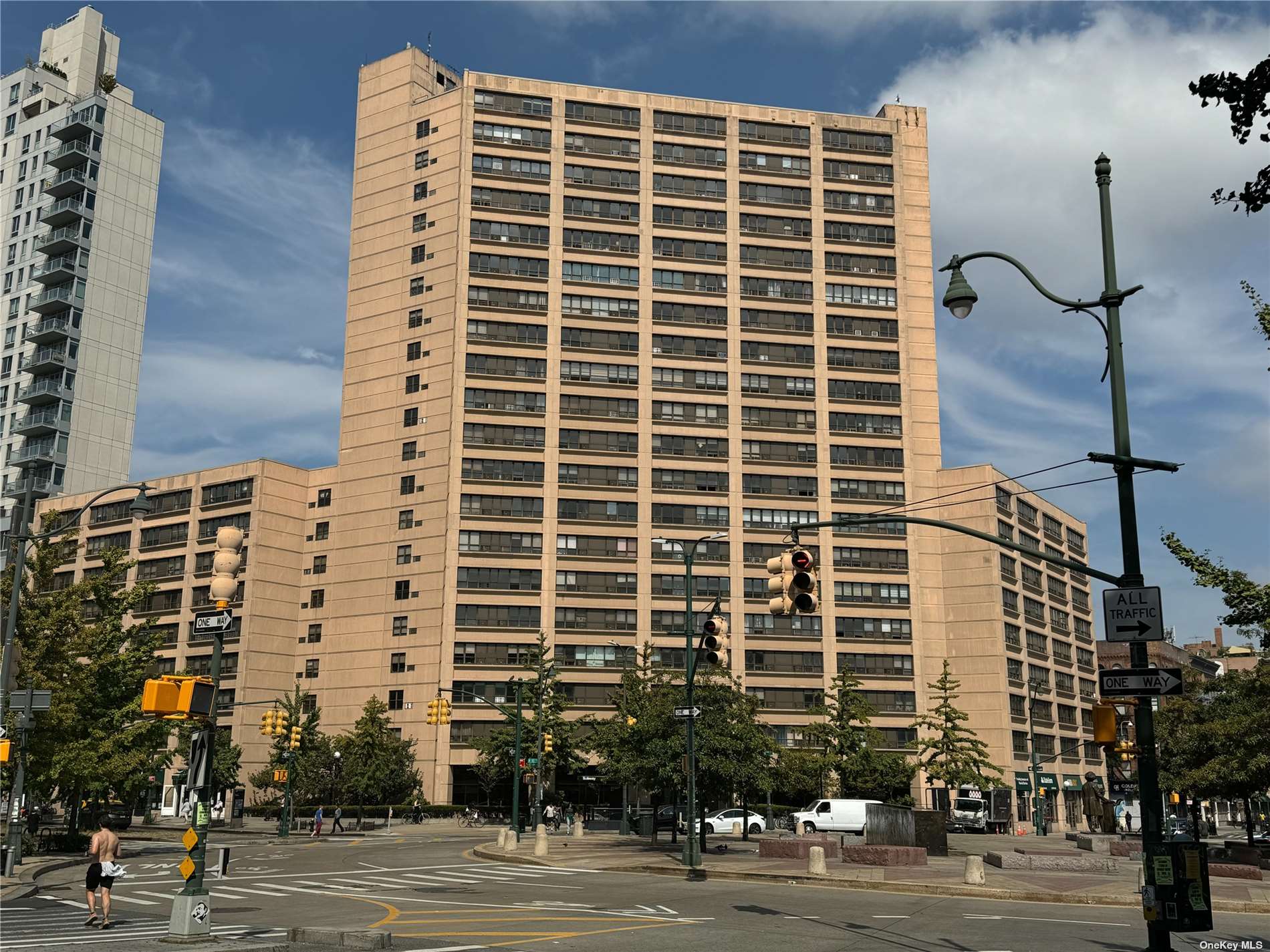 a front view of a building with a street