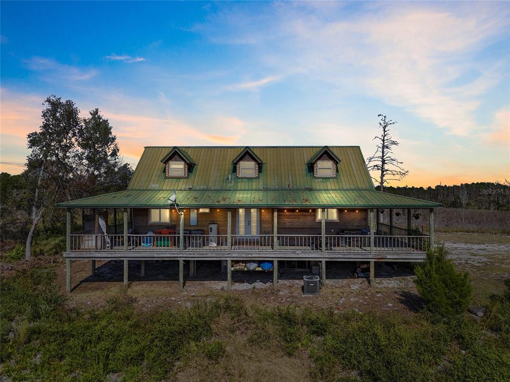 a view of a house with roof deck