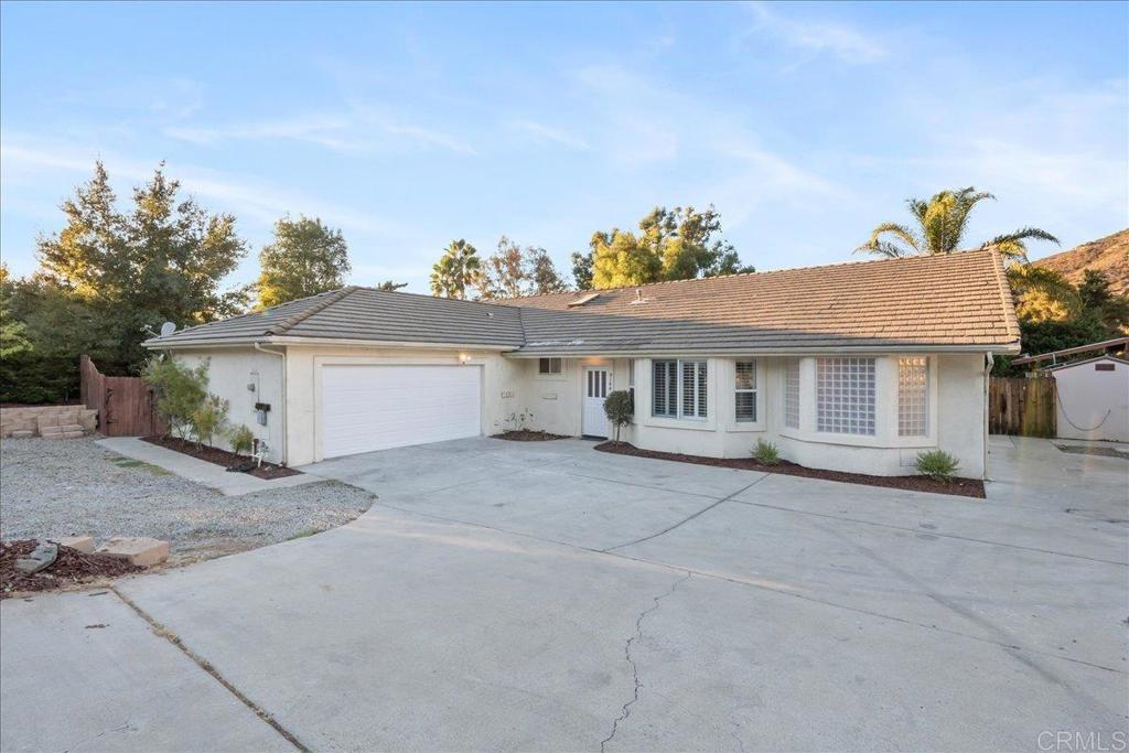 a front view of a house with a garage