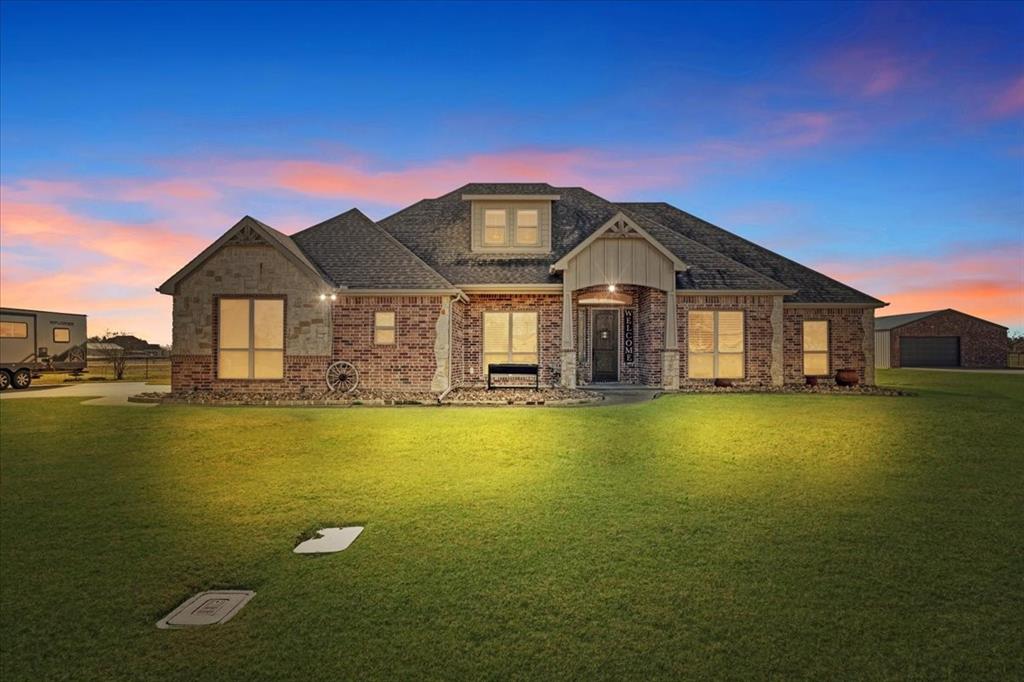 a front view of a house with swimming pool