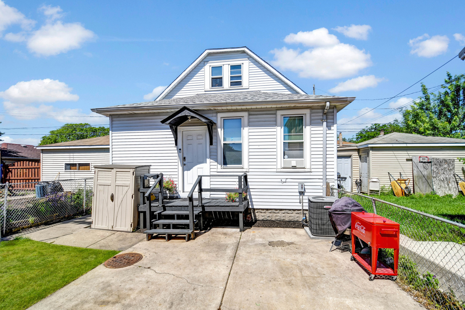 a front view of a house with patio