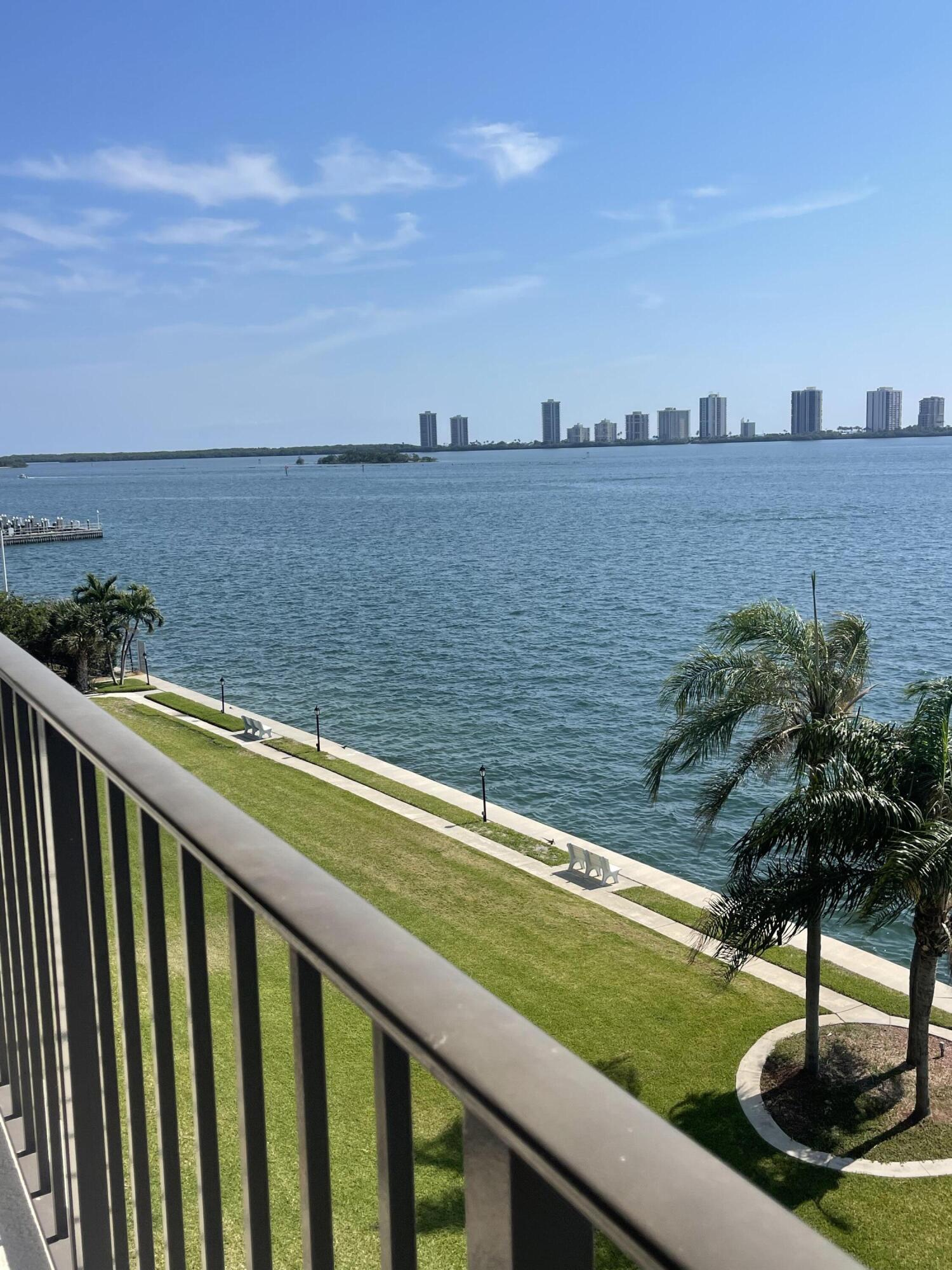 a view of a balcony next to a lake view