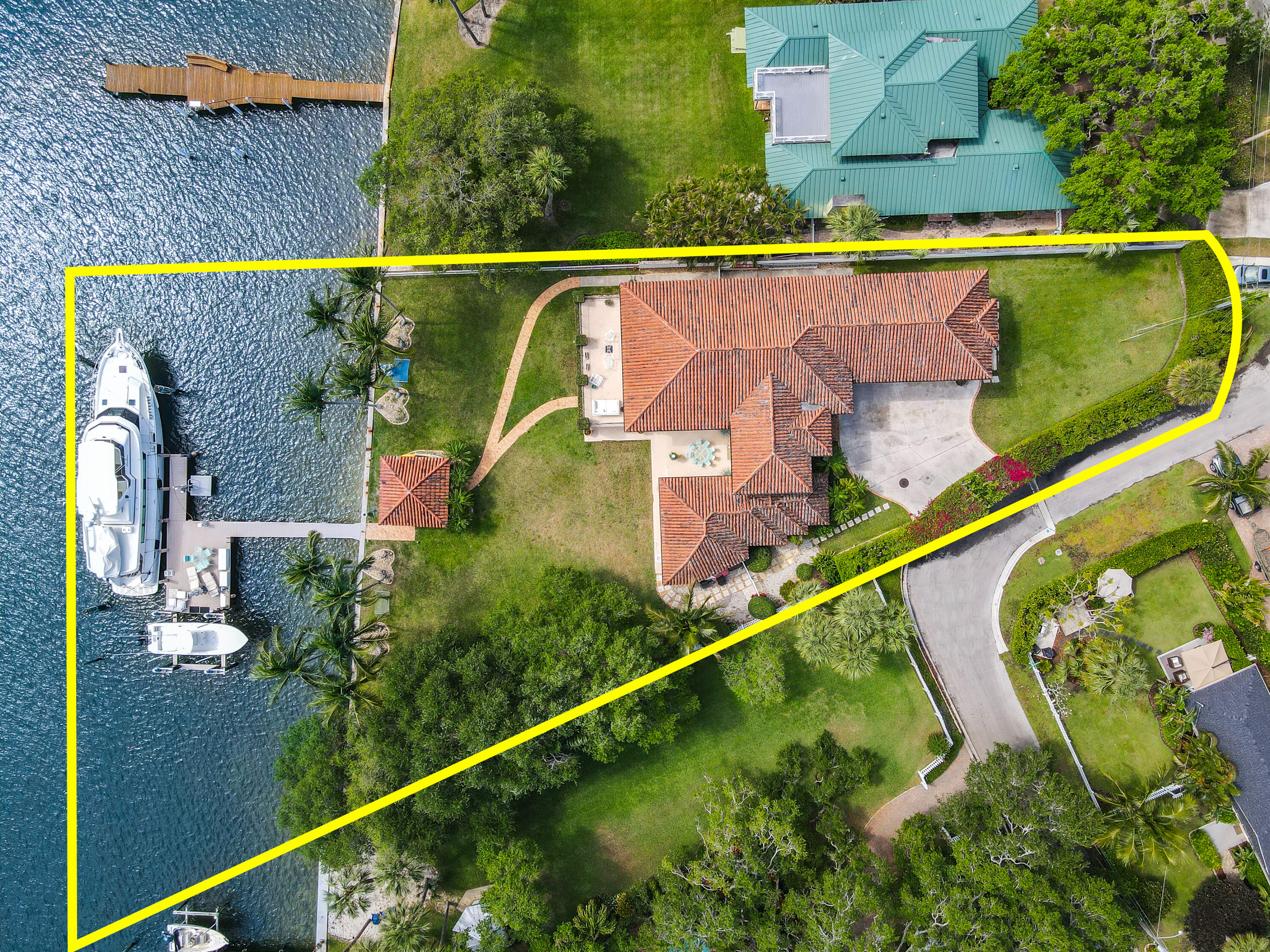 an aerial view of a house with a garden