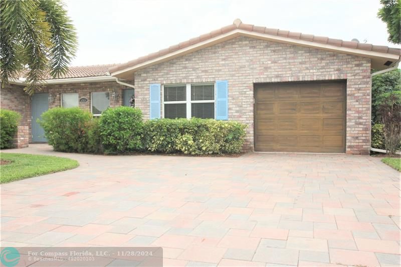 front view of a house and a yard