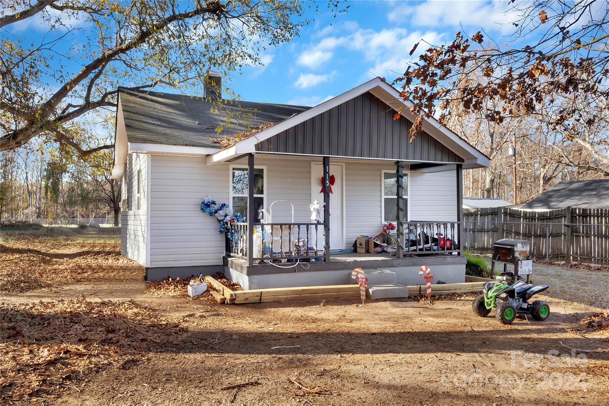 a front view of a house with garage