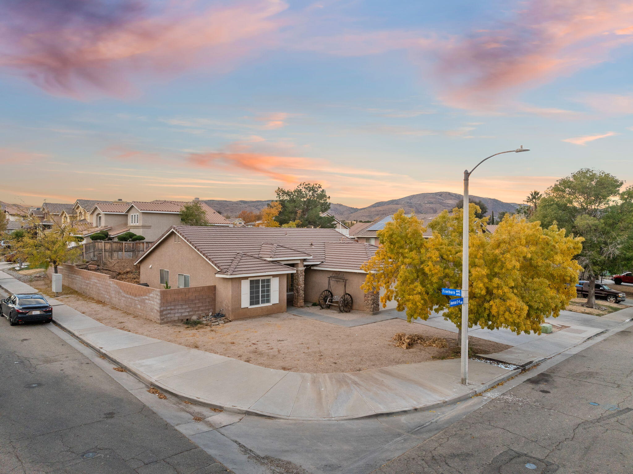 a view of a house with a street