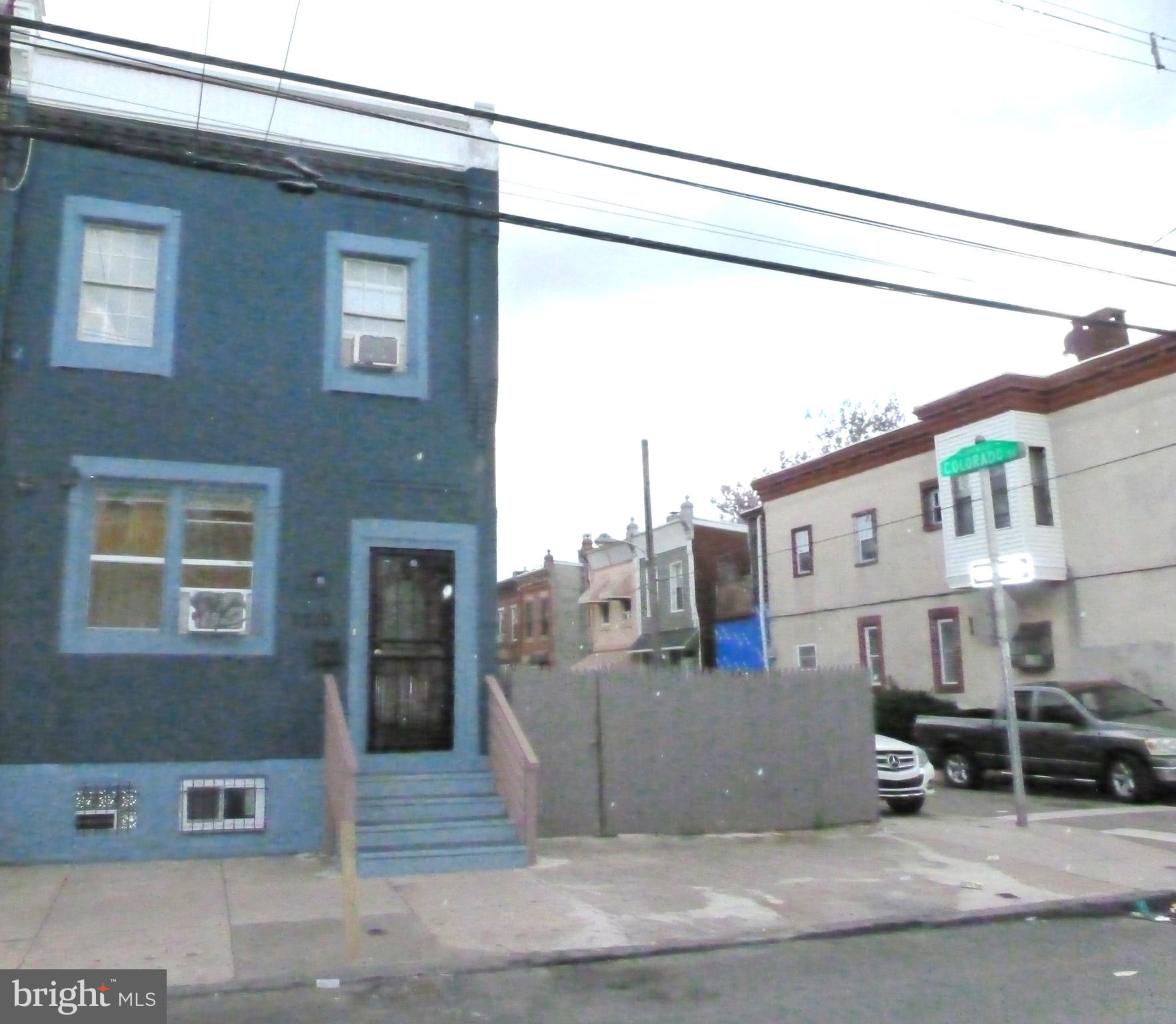 a view of a house with a street