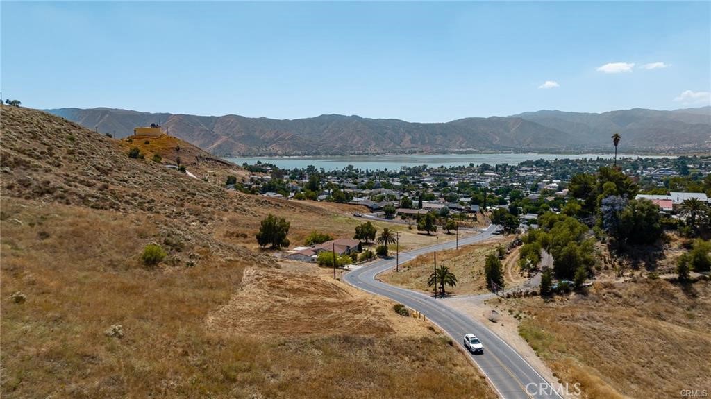 a view of a town with mountains in the background