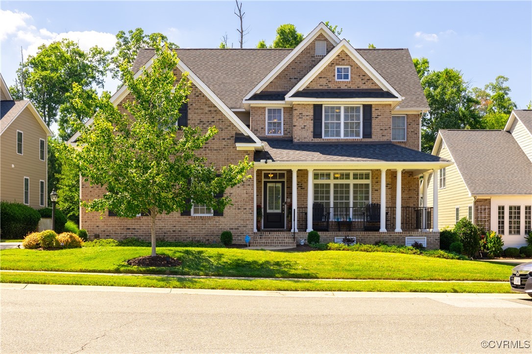 Craftsman inspired home with a porch and a front l