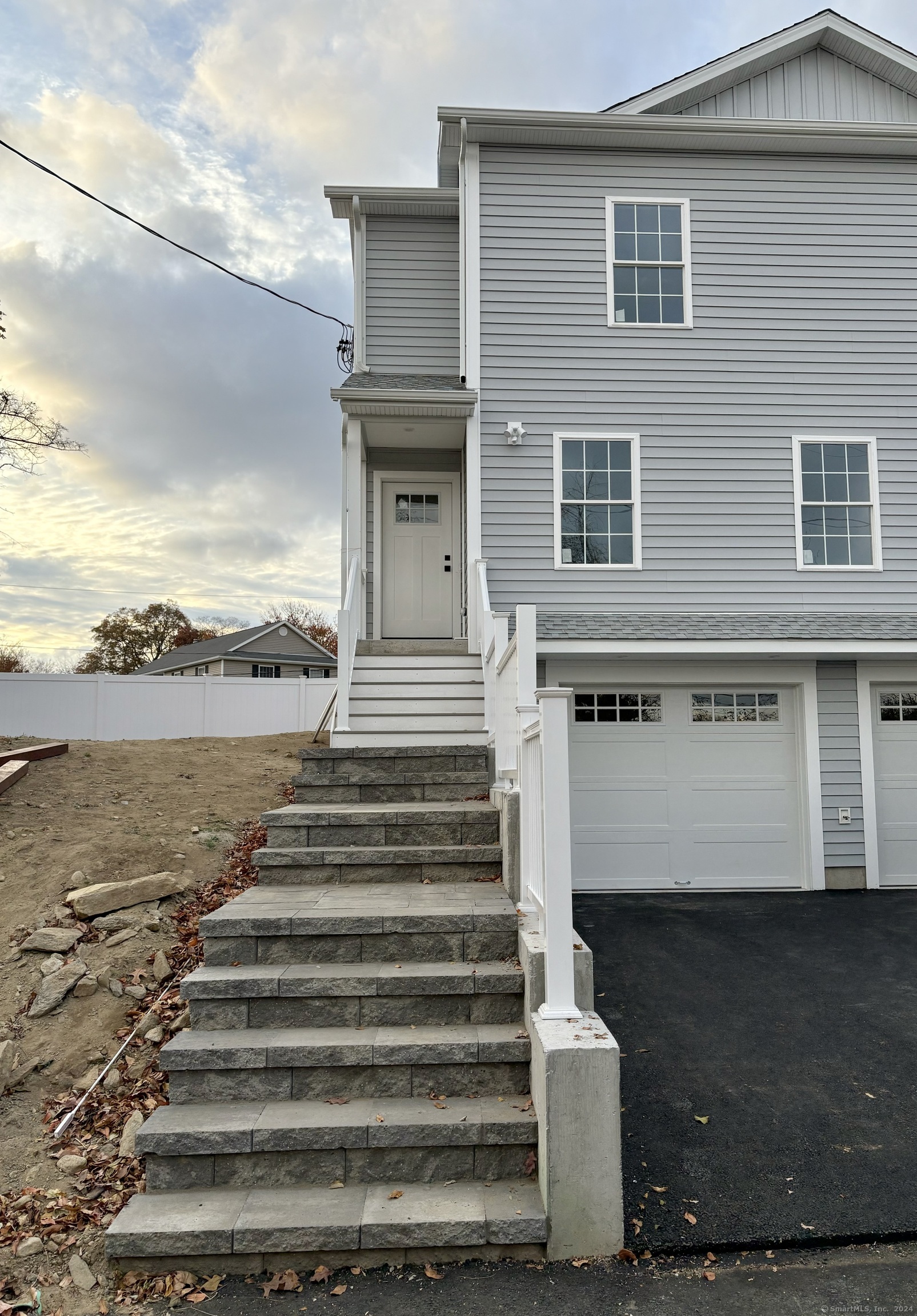 a front view of a house with ocean view