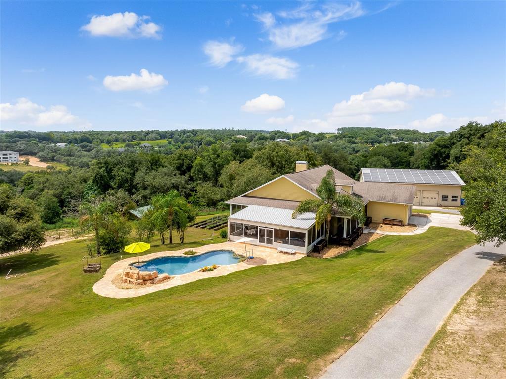 a view of a house with a big yard