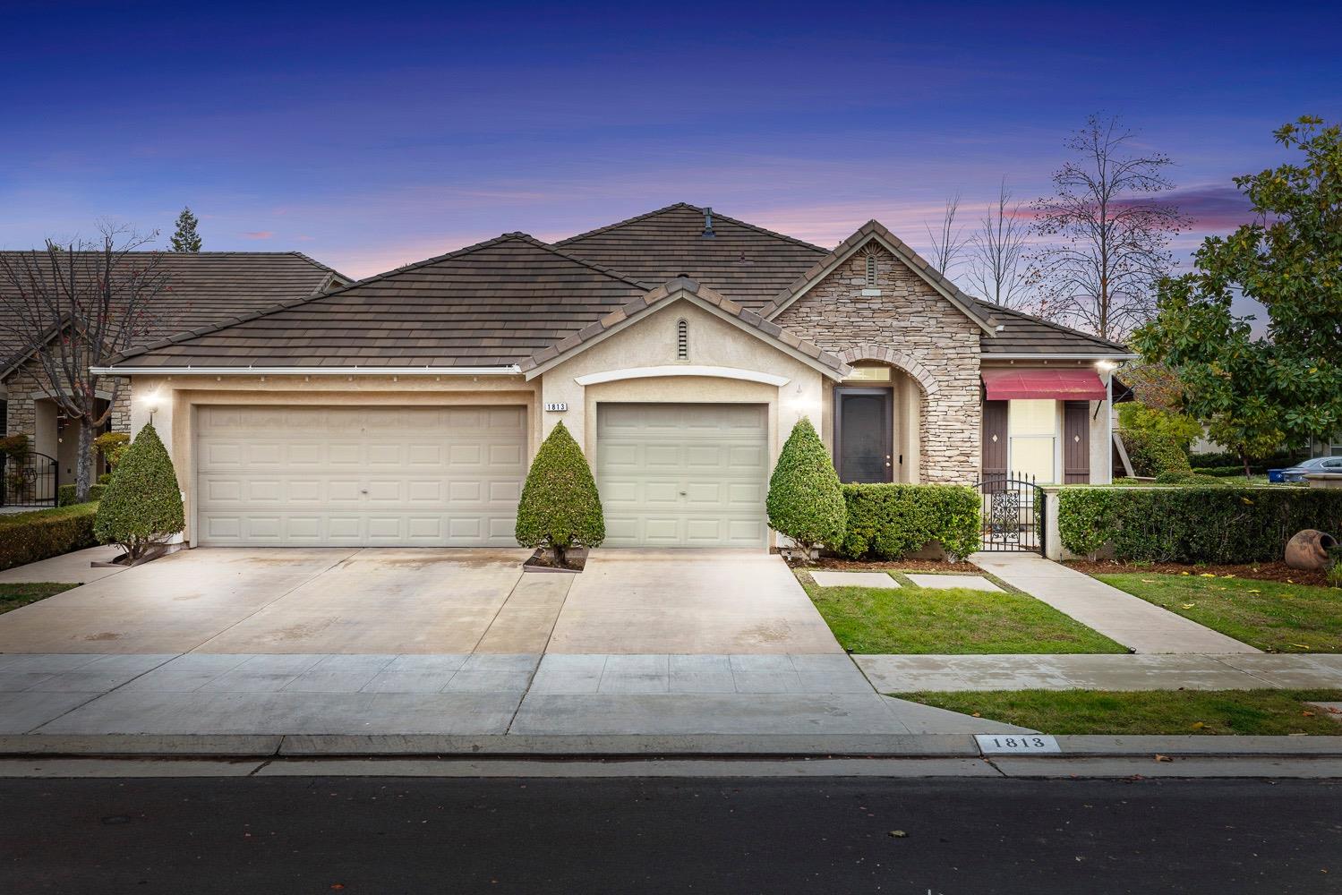 front view of house with a yard