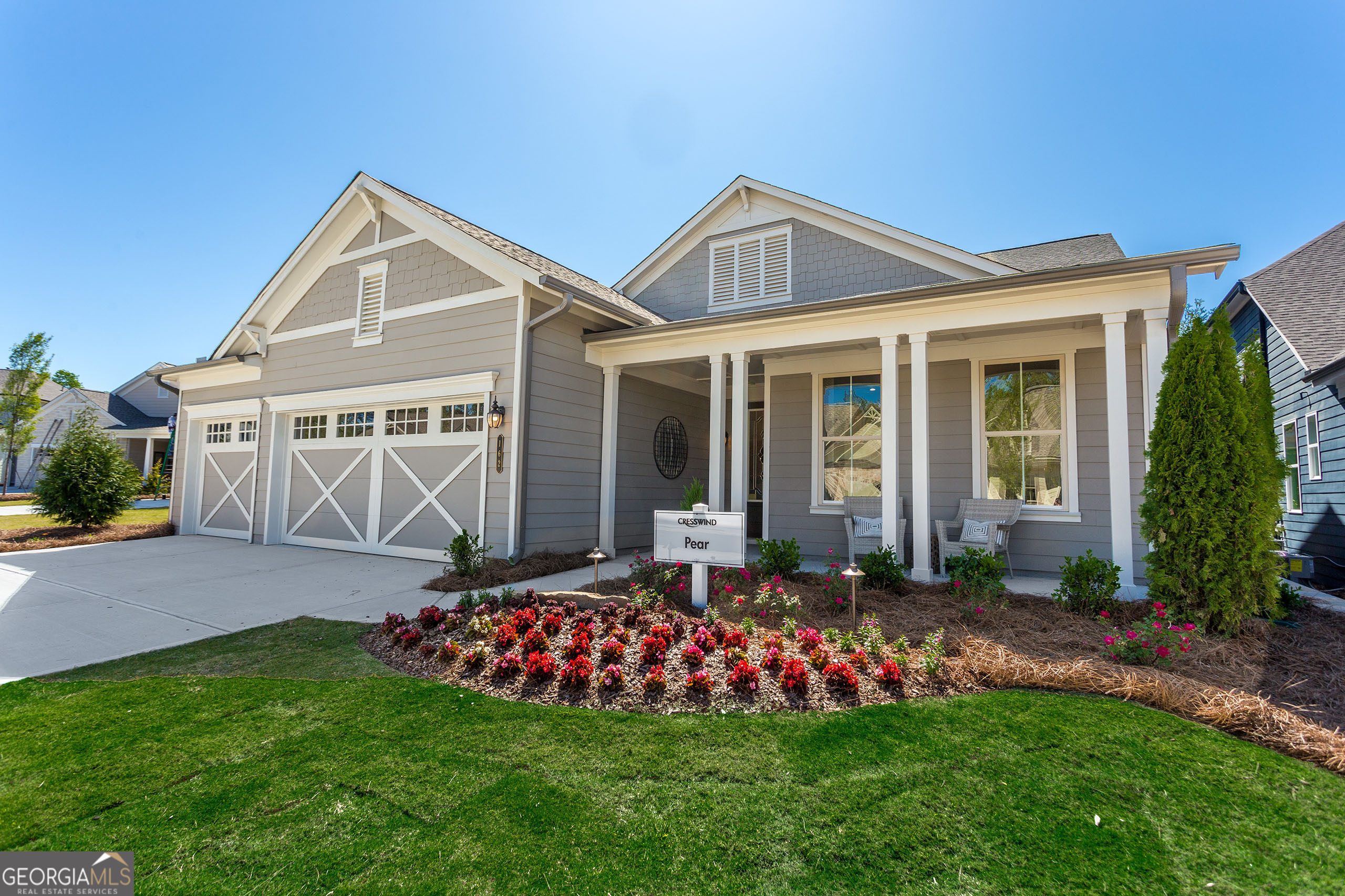 a front view of a house with garden