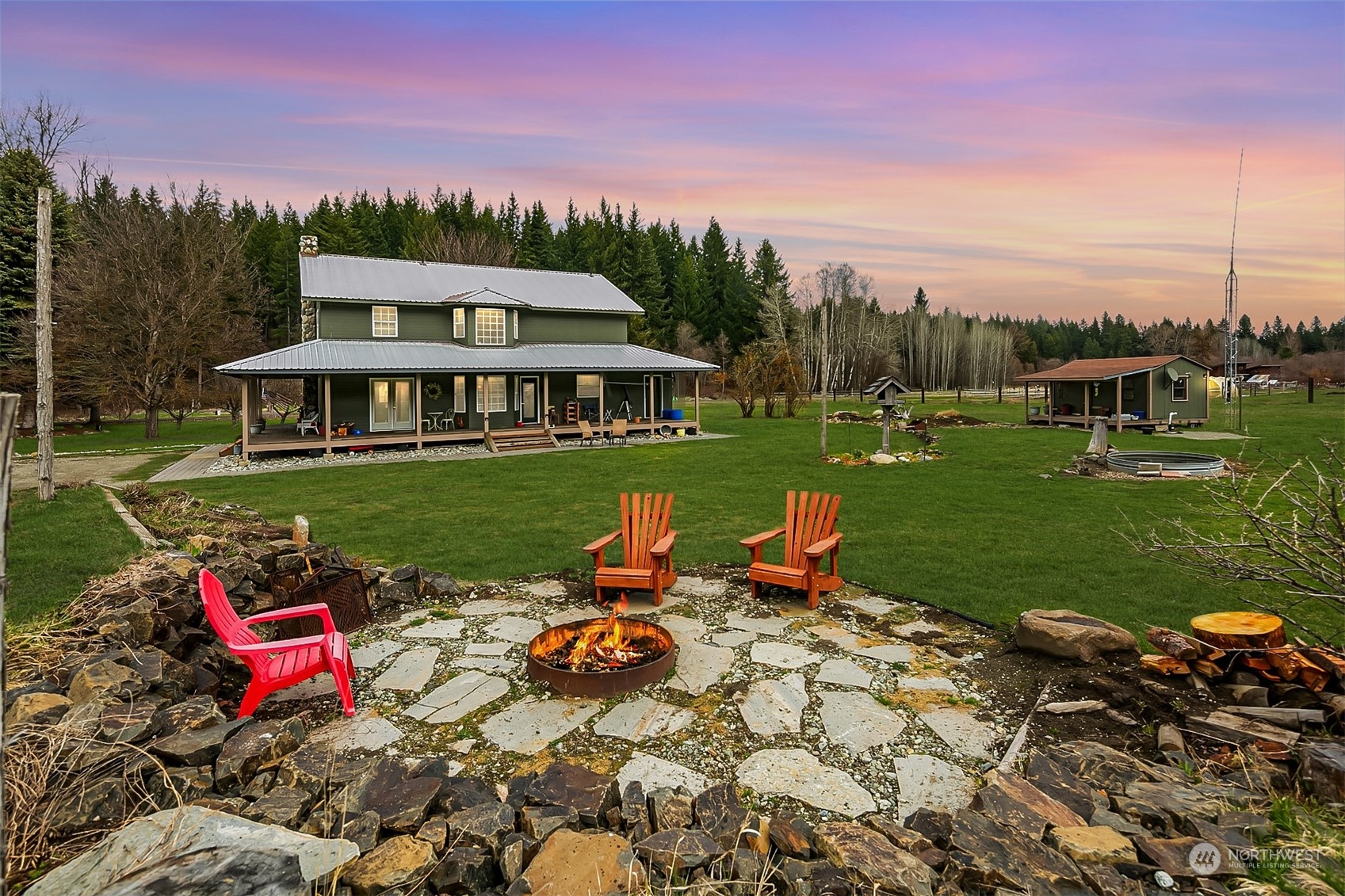 a view of a house with backyard porch and garden