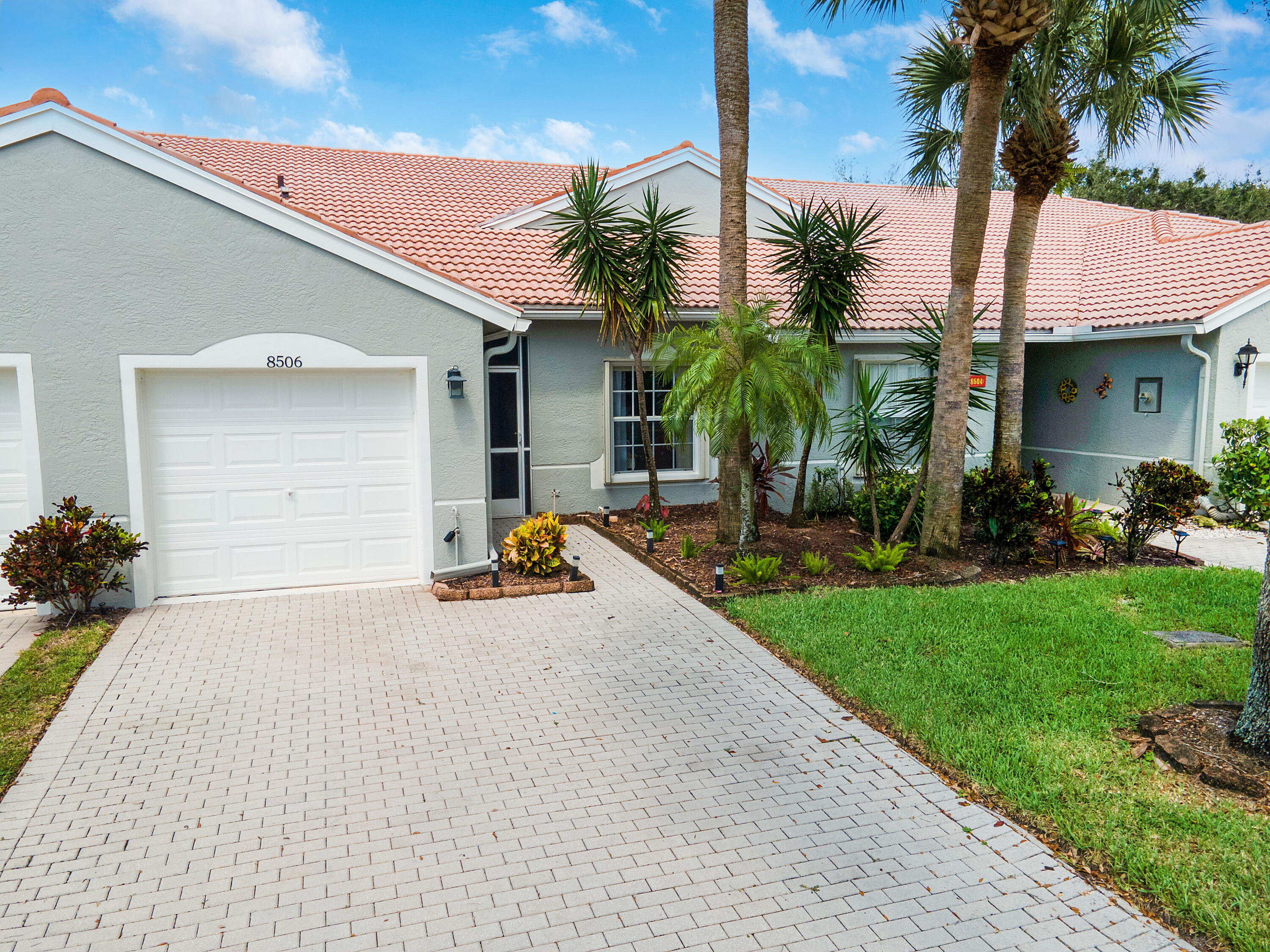 a view of a backyard with a patio