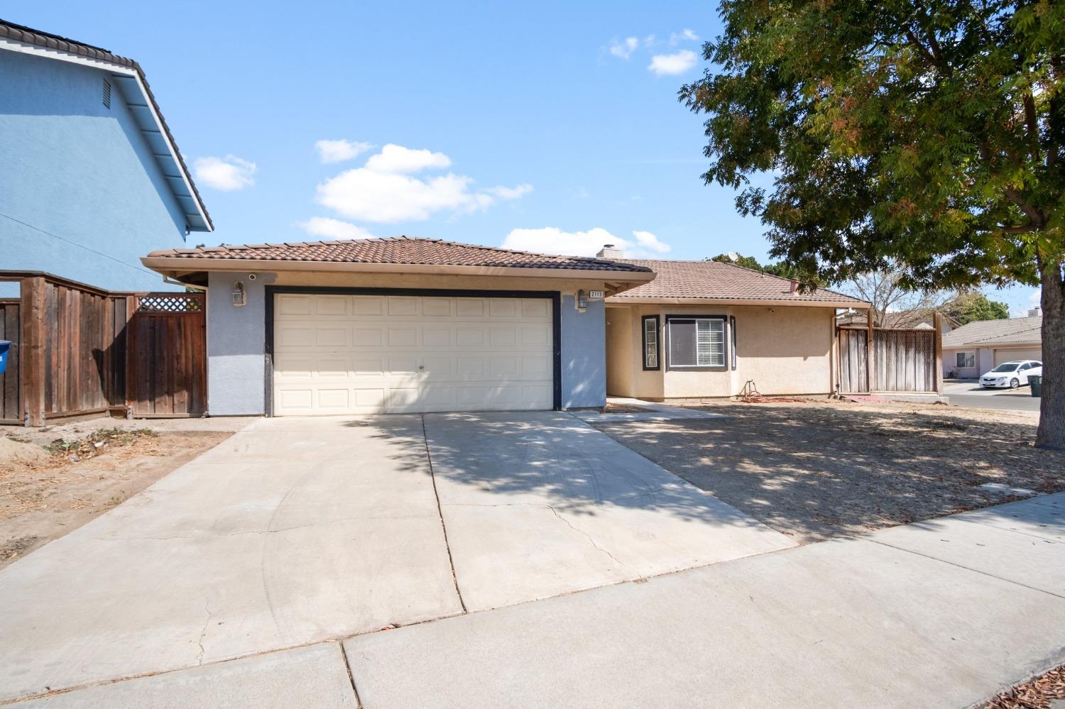 a view of a house with a patio