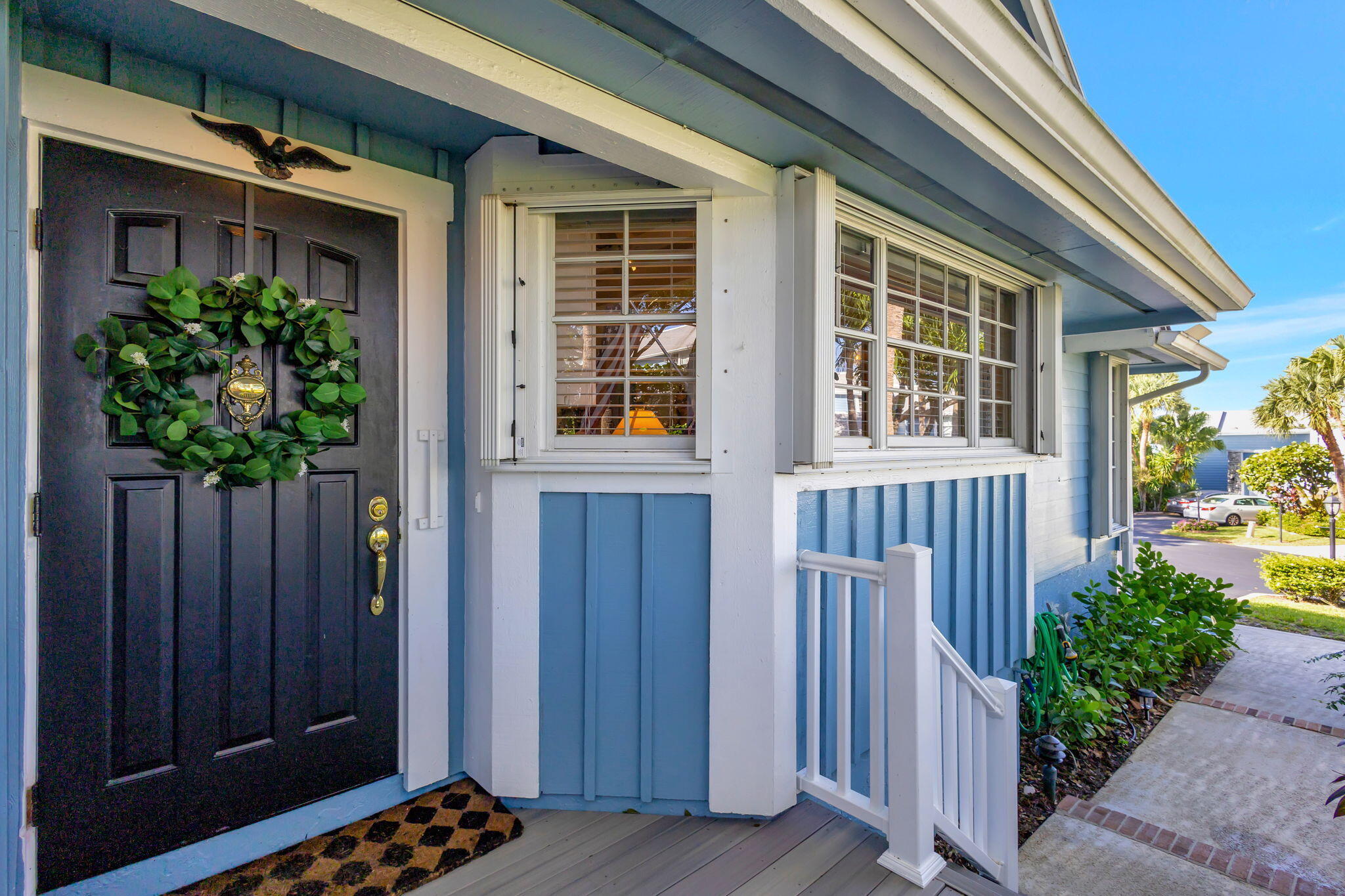 a front view of a house with a porch