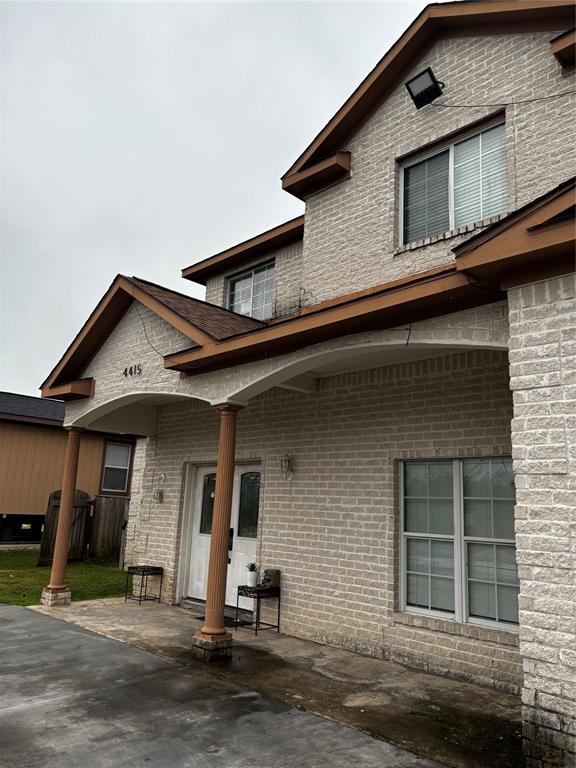 a front view of a house with a garage