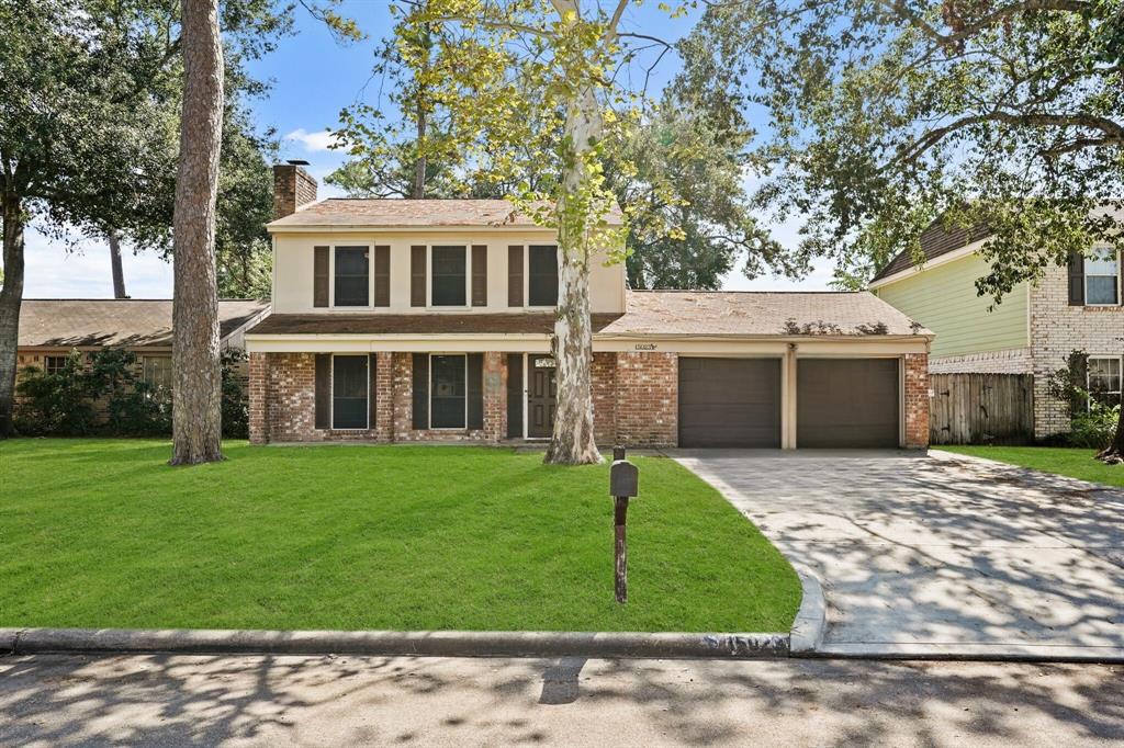 Welcome home to 15023 Cypress Green Dr. This two-story suburban home offers a mix of brick and siding exterior, featuring a double garage, large windows, and mature trees all tucked away in the friendly subdivision of Fairwood.