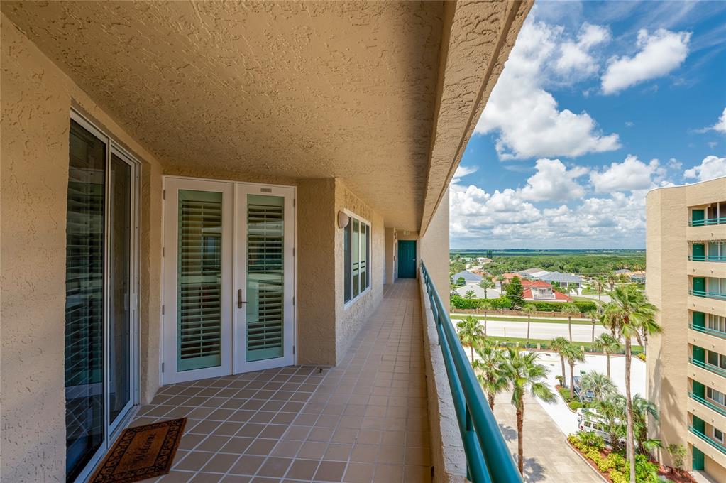 a view of a balcony with an outdoor space