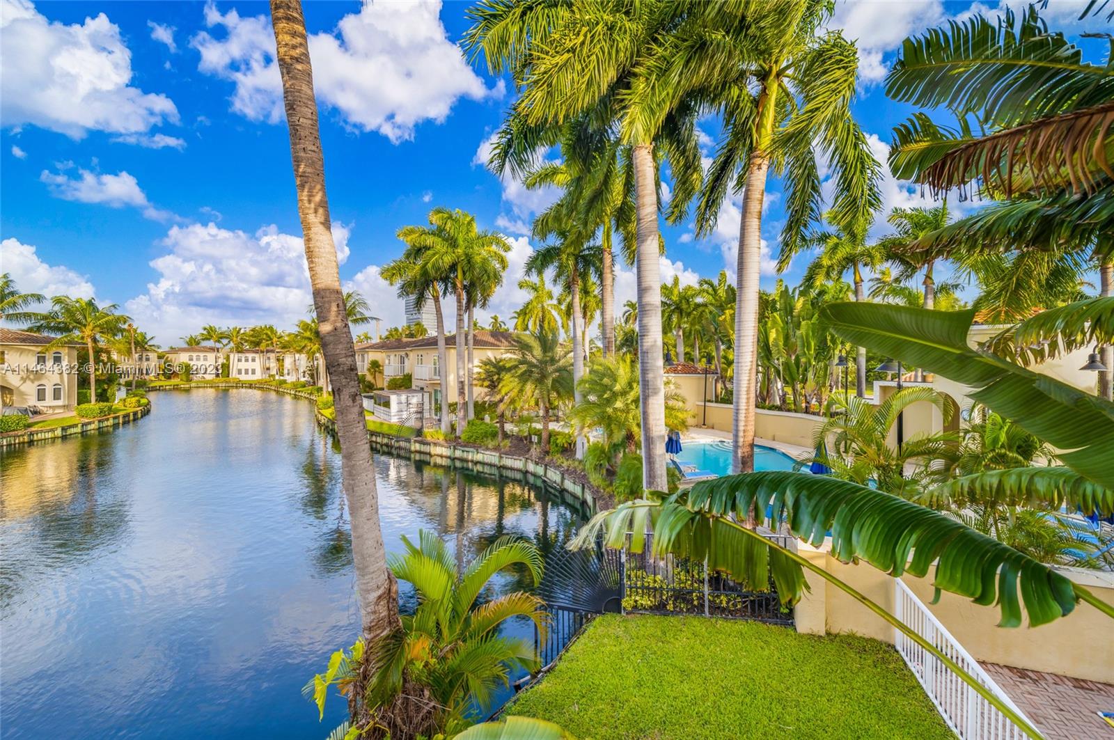 a view of swimming pool yard from a patio