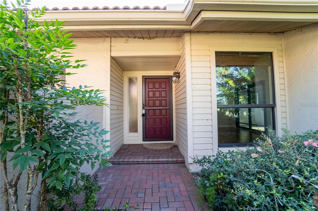 a front view of a house with a porch