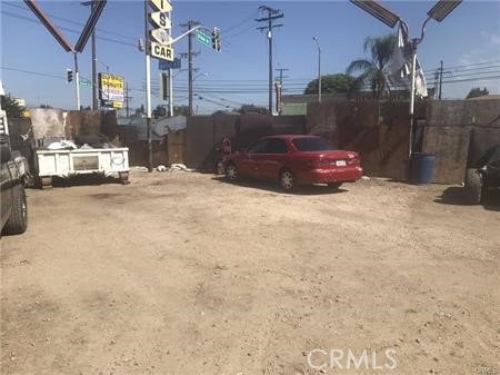 a view of a street with cars