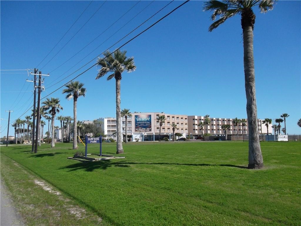 a view of a park with a slide