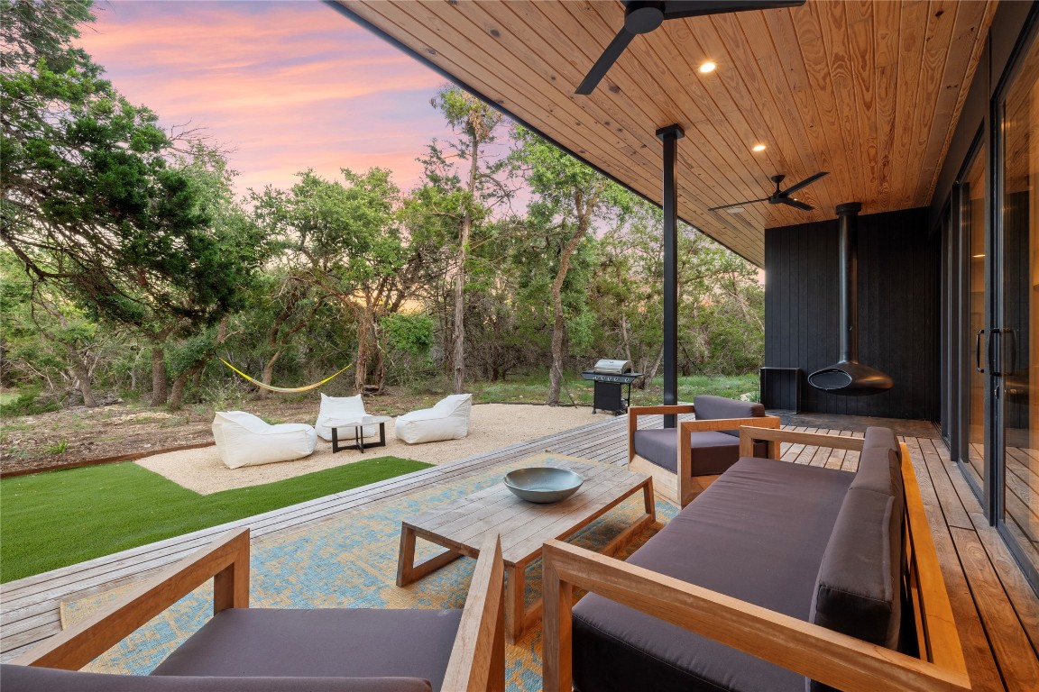 a view of an outdoor sitting area with furniture