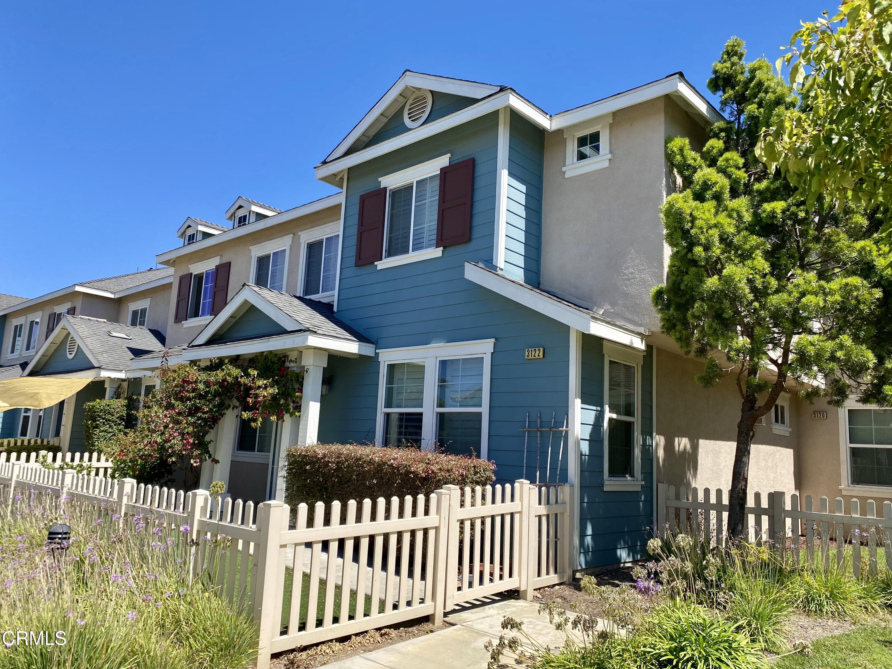 a front view of a house with a porch