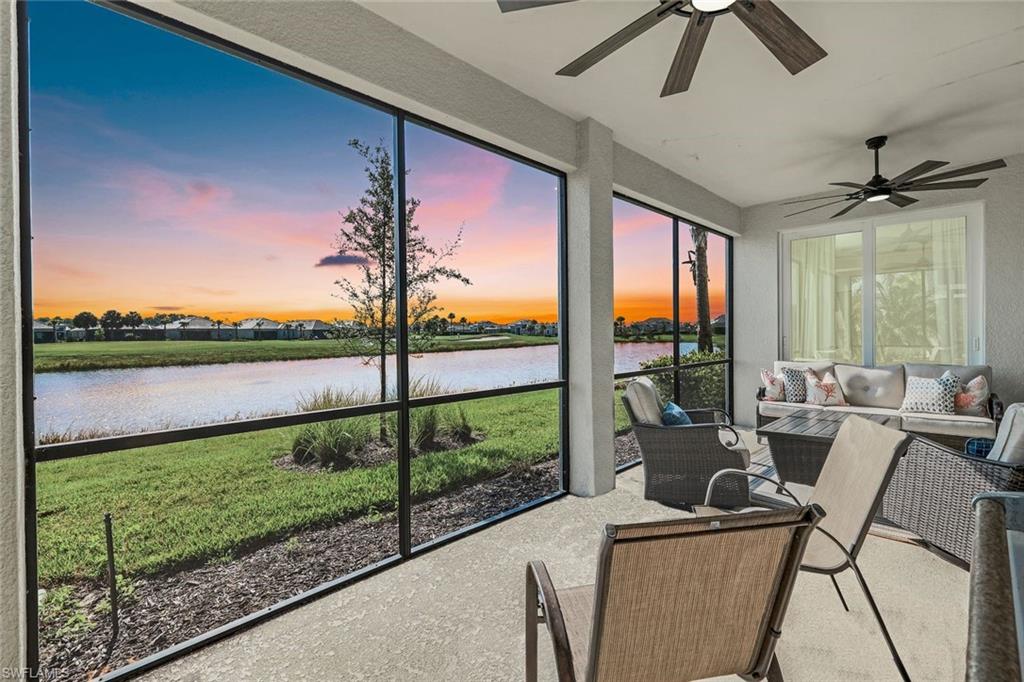 a living room with hardwood floor and balcony view