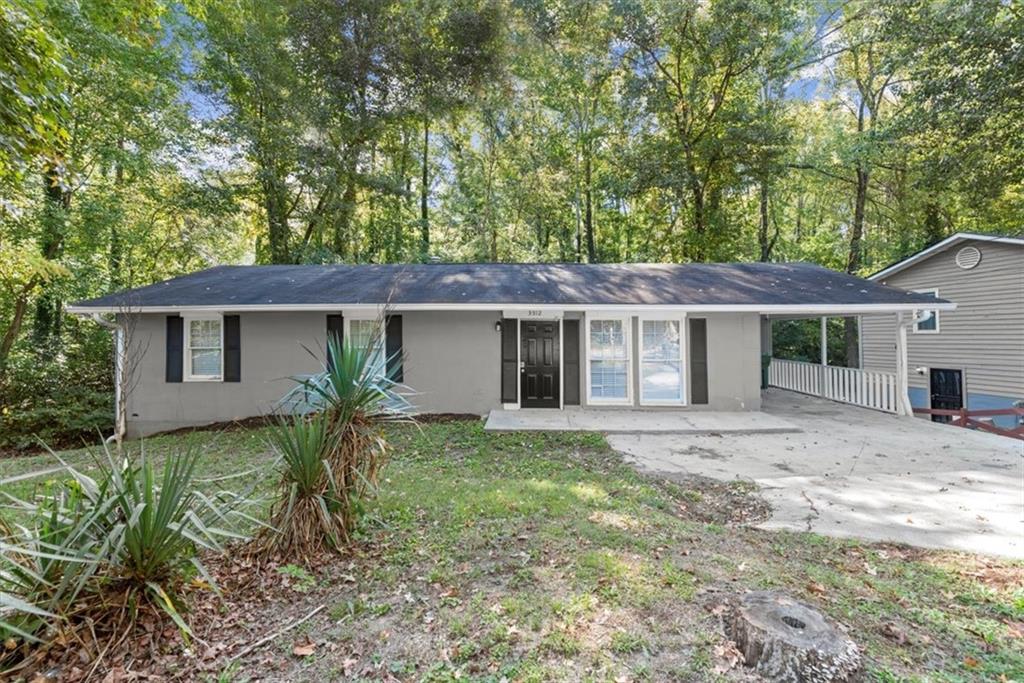 front view of a house with a yard