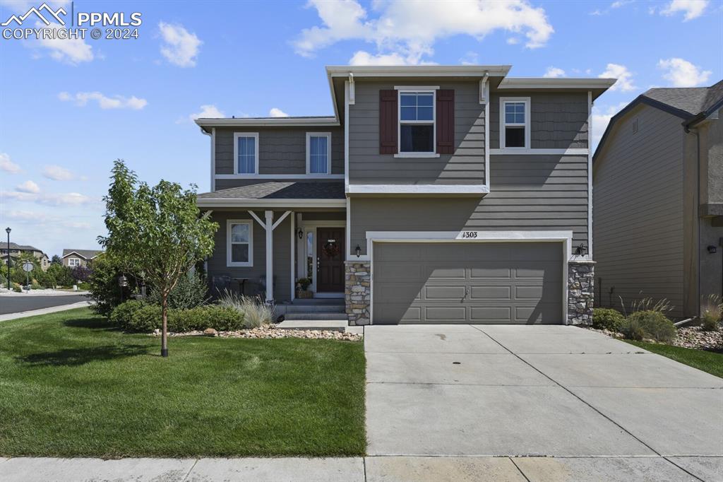 front view of house with a yard