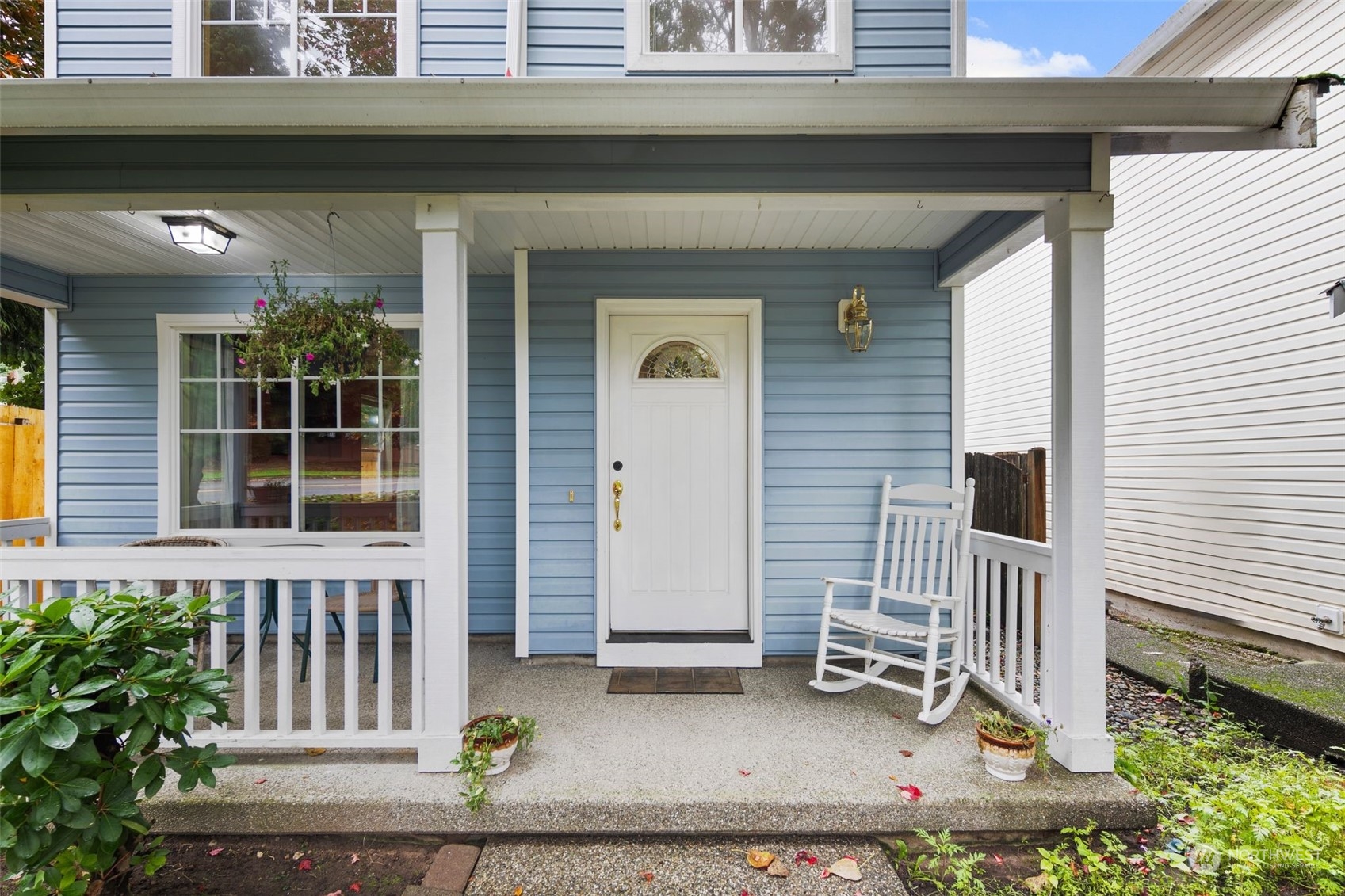 a front view of a house with a porch