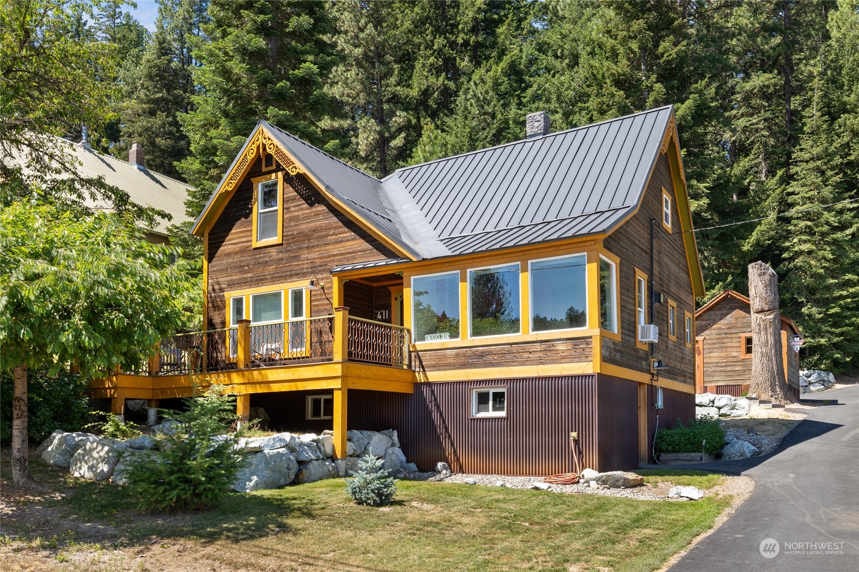 front view of a house with a yard