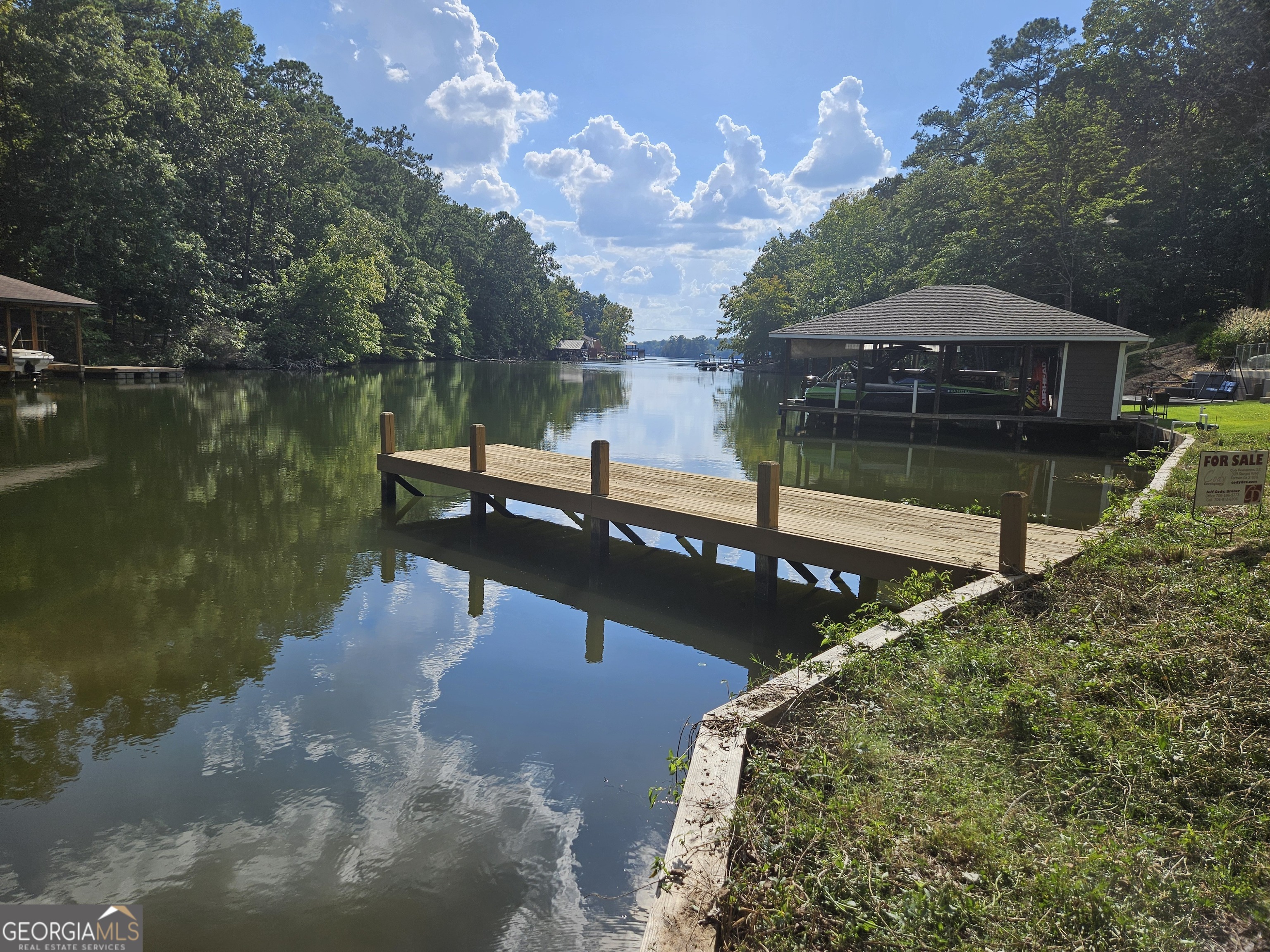 a view of a lake from a balcony