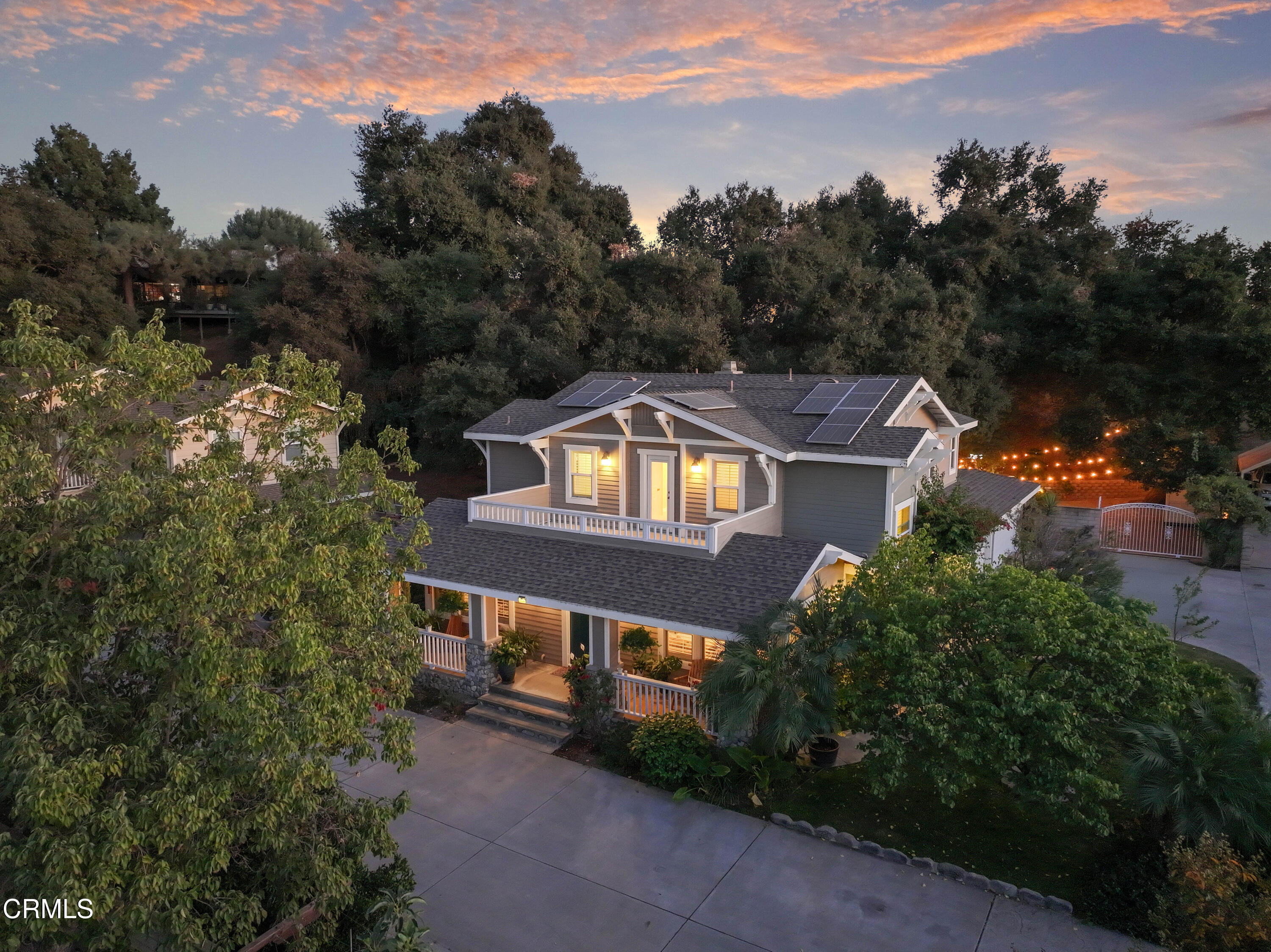 an aerial view of a house with a garden